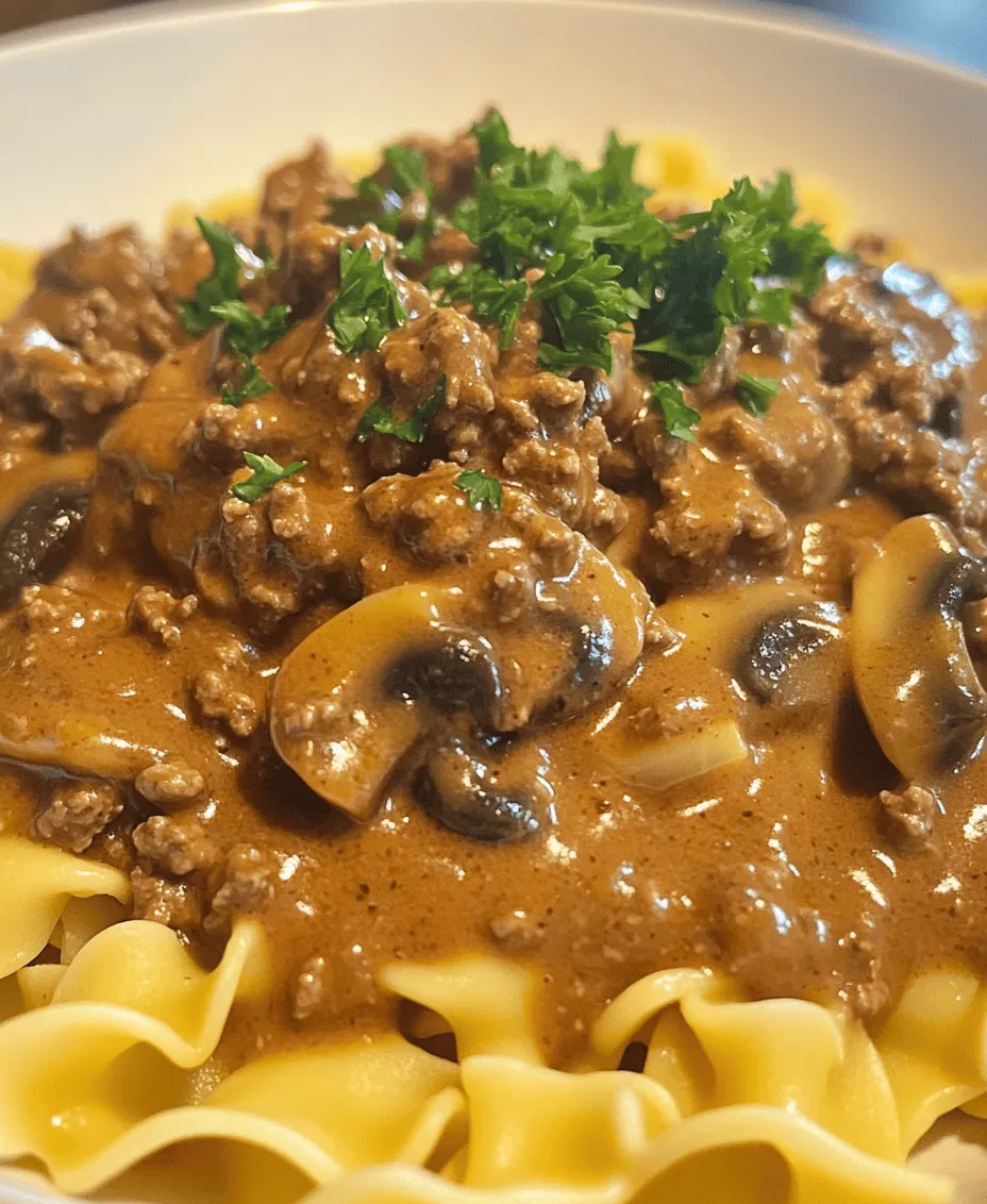 Savory Ground Beef Stroganoff is a classic comfort dish that has warmed the hearts and filled the bellies of families for generations. With its rich flavors and creamy texture, this dish brings a sense of satisfaction that can only come from a home-cooked meal. Imagine tender ground beef simmered with mushrooms and onions in a luscious cream sauce, served over a bed of egg noodles or rice. It's the kind of meal that transforms an ordinary weeknight into something special, making it an ideal choice for busy families and cozy gatherings alike.