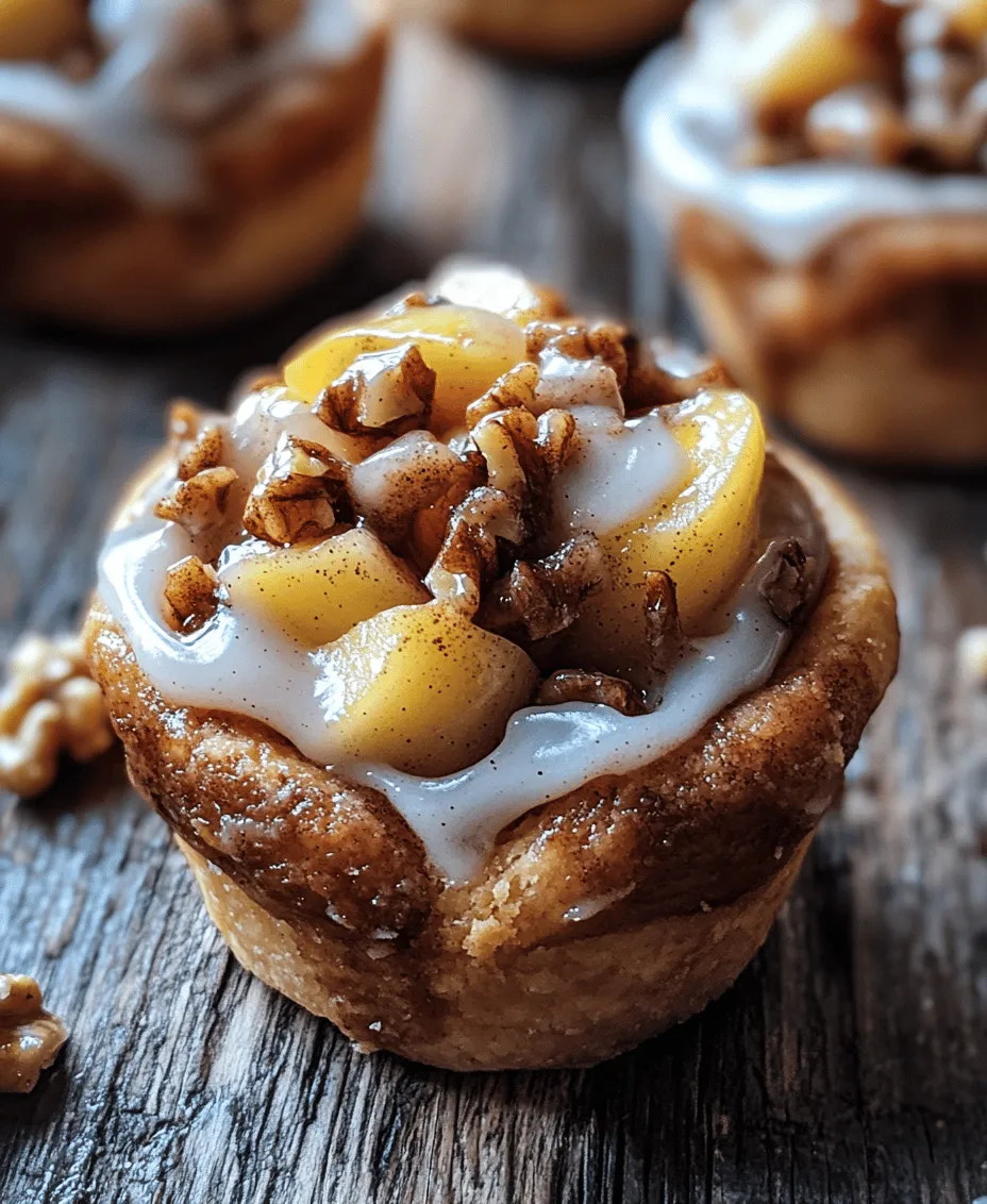 1. <strong>Preheat the Oven</strong>: The first step in any baking recipe is to preheat your oven. Set it to 350°F (175°C) to ensure that your cinnamon roll cups bake evenly and thoroughly.” /></p>
</p>
<h2>How Spices and Sugars Work Together to Enhance Apple Flavor</h2>
</p>
<p>When it comes to desserts, the combination of spices and sugars plays a crucial role in elevating the natural flavors of ingredients, particularly apples. Cinnamon, nutmeg, and brown sugar are classic companions for apples, enhancing their sweetness while adding warmth and depth. Cinnamon introduces a comforting, aromatic element that complements the tartness of the apples. Nutmeg contributes a hint of earthiness, creating a multidimensional flavor profile that invites your taste buds to explore.</p>
</p>
<p>Brown sugar, with its rich molasses undertones, caramelizes beautifully during baking, producing a delightful contrast with the crispness of the apple filling. This combination not only enhances the apple flavor but also allows each bite to be a harmonious blend of sweetness and spice, making it the perfect filling for our Cinnamon Roll Apple Pie Cups.</p>
</p>
<h2>Assembling the Cups</h2>
</p>
<p>Now that you have your spiced apple filling prepared, it’s time to assemble your Cinnamon Roll Apple Pie Cups. Start by preheating your oven to 375°F (190°C). While the oven heats, gather your ingredients and muffin tin.</p>
</p>
<p>1. <strong>Prepare the Cinnamon Roll Dough</strong>: If you’re using store-bought cinnamon roll dough, open the can and carefully unroll it, keeping the cinnamon filling intact. If you’re making your own dough, roll it out on a lightly floured surface to about ¼ inch thick.</p>
</p>
<p>2. <strong>Cut the Dough</strong>: Using a round cutter or a glass, cut out circles from the dough that are slightly larger than the cups of your muffin tin. This ensures that the dough covers the bottom and up the sides of each cup.</p>
</p>
<p>3. <strong>Grease the Muffin Tin</strong>: Lightly grease the muffin tin with non-stick cooking spray or butter to prevent sticking.</p>
</p>
<p>4. <strong>Shape the Cups</strong>: Gently press each dough circle into the muffin tin, making sure it molds to the shape of the cup. The dough should come up just slightly above the edges, as the filling will expand during baking.</p>
</p>
<p>5. <strong>Fill with Apple Mixture</strong>: Spoon the spiced apple filling into each cup, being mindful not to overfill. It’s important to leave some space at the top to prevent the filling from bubbling over during baking.</p>
</p>
<h3>Proper Techniques for Shaping Cinnamon Rolls in Muffin Tins</h3>
</p>
<p>To ensure your cinnamon roll cups turn out perfectly, follow these shaping techniques:</p>
</p>
<p>– <strong>Use Cold Dough</strong>: If you’re using homemade dough, ensure that it’s cold when working with it. Chilled dough is easier to handle and will hold its shape better in the muffin tin.</p>
</p>
<p>– <strong>Avoid Stretching</strong>: When pressing the dough into the muffin tin, avoid stretching it too much. This can cause the dough to shrink back during baking, leading to uneven shapes.</p>
</p>
<p>– <strong>Create a Well</strong>: Make sure to press the dough firmly into the bottom and sides, creating a well that will hold the filling securely.</p>
</p>
<h3>Importance of Not Overfilling to Prevent Spills During Baking</h3>
</p>
<p>Overfilling can lead to messy spills in your oven, which can not only affect the presentation of your Cinnamon Roll Apple Pie Cups but also create a difficult cleanup situation. Aim to fill each cup about three-quarters full. This allows the filling to bubble and cook without overflowing. If you have extra filling, consider making a small crumble topping or serving it alongside the cups for added sweetness.</p>
</p>
<h2>Baking Process</h2>
</p>
<p>Once your cups are assembled, it’s time to bake them. Place the muffin tin in the preheated oven and set a timer for 18-20 minutes.</p>
</p>
<h3>Understanding Baking Times and Visual Cues for Doneness</h3>
</p>
<p>Baking times can vary based on your oven, so it’s essential to keep an eye on the cups as they bake. Look for the following visual cues to determine doneness:</p>
</p>
<p>– <strong>Color</strong>: The tops of the cinnamon roll cups should be golden brown. This indicates that the dough is cooked through and has developed a pleasing texture.</p>
</p>
<p>– <strong>Filling Bubbling</strong>: You should see the apple filling bubbling slightly. This is a sign that the apples are cooking down and that flavors are melding together perfectly.</p>
</p>
<h3>Tips for Ensuring Even Baking and Preventing Burning</h3>
</p>
<p>To achieve evenly baked Cinnamon Roll Apple Pie Cups and to prevent burning, consider the following tips:</p>
</p>
<p>– <strong>Rotate the Pan</strong>: If your oven has hot spots, rotate the muffin tin halfway through the baking process to ensure even cooking.</p>
</p>
<p>– <strong>Check for Doneness Early</strong>: Start checking for doneness a few minutes before the timer goes off. If they’re done early, remove them to prevent overbaking.</p>
</p>
<p>– <strong>Use a Toothpick</strong>: Insert a toothpick into the center of the cup. If it comes out clean or with a few moist crumbs, they are ready; if it comes out wet, give them a few more minutes.</p>
</p>
<h2>Adding the Icing Drizzle</h2>
</p>
<p>Once the Cinnamon Roll Apple Pie Cups are out of the oven and slightly cooled, it’s time to add the icing drizzle.</p>
</p>
<h3>Techniques for a Beautiful Presentation with the Icing</h3>
</p>
<p>1. <strong>Make the Icing</strong>: Combine powdered sugar with a splash of milk and a drop of vanilla extract in a small bowl. Adjust the consistency by adding more milk or sugar until you reach a drizzling consistency.</p>
</p>
<p>2. <strong>Use a Piping Bag</strong>: For a clean and professional look, transfer the icing into a piping bag or a ziplock bag with the corner snipped off. Drizzle over the cooled cups in a zigzag pattern.</p>
</p>
<p>3. <strong>Sprinkle with Cinnamon</strong>: For an added touch, dust the tops with a sprinkle of cinnamon or a pinch of nutmeg, enhancing the visual appeal and aroma.</p>
</p>
<h3>Flavor Balance Between the Sweet Icing and Spiced Apples</h3>
</p>
<p>The sweet icing beautifully complements the spiced apple filling, creating a delightful balance of flavors. The slight sweetness of the icing rounds out the tartness of the apples, while the spices add depth to every bite.</p>
</p>
<h2>Serving Suggestions</h2>
</p>
<p>To truly enjoy your Cinnamon Roll Apple Pie Cups, consider the following serving suggestions:</p>
</p>
<h3>Ideal Serving Temperature for Flavor Enjoyment</h3>
</p>
<p>These cups are best served warm. Allow them to cool for about 10 minutes after baking, then serve them fresh. The warmth enhances the flavors and creates a comforting experience.</p>
</p>
<h3>Pairing Ideas: Beverages that Complement the Dessert</h3>
</p>
<p>Pair these delightful cups with a variety of beverages to enhance your dessert experience. Here are some ideas:</p>
</p>
<p>– <strong>Coffee</strong>: A warm cup of coffee, whether black or with cream, complements the sweet and spiced flavors beautifully.</p>
<p>– <strong>Tea</strong>: A light herbal tea, such as chamomile or a spiced chai, can provide a soothing contrast.</p>
<p>– <strong>Cider</strong>: For an autumnal touch, serve with warm apple cider, which echoes the apple flavor in the cups.</p>
</p>
<h3>Creative Serving Ideas for Special Occasions</h3>
</p>
<p>For special occasions, consider presenting your Cinnamon Roll Apple Pie Cups on a decorative platter. Garnish with fresh apple slices or cinnamon sticks for a beautiful centerpiece. For a festive touch, serve with a scoop of vanilla ice cream or a dollop of whipped cream on the side, allowing guests to customize their dessert experience.</p>
</p>
<h2>Nutritional Information</h2>
</p>
<p>Understanding the nutritional aspects of your dessert can help you enjoy it more mindfully. Here’s a breakdown of the typical nutritional information per serving:</p>
</p>
<p>– <strong>Calories</strong>: Approximately 200-250 calories per cup.</p>
<p>– <strong>Carbohydrates</strong>: Around 30-35 grams, mainly from the dough and apple filling.</p>
<p>– <strong>Sugars</strong>: About 10-15 grams, depending on the sweetness of the apples and the icing.</p>
<p>– <strong>Fat</strong>: Approximately 8-10 grams, primarily from the dough and icing.</p>
</p>
<h3>Healthier Alternatives for Ingredient Substitutions</h3>
</p>
<p>If you’re looking to make your Cinnamon Roll Apple Pie Cups a bit healthier, consider these substitutions:</p>
</p>
<p>– <strong>Whole Wheat Flour</strong>: Substitute half or all of the all-purpose flour with whole wheat flour for added fiber.</p>
<p>– <strong>Low-Calorie Sweetener</strong>: Use a sugar substitute in the filling or icing to cut down on sugar content.</p>
<p>– <strong>Unsweetened Applesauce</strong>: Replace some of the butter in the dough with unsweetened applesauce to reduce fat.</p>
</p>
<h3>Discussing Moderation and Indulgence in Desserts</h3>
</p>
<p>While these cups are a delightful treat, moderation is key. Enjoying desserts like these occasionally can be part of a balanced diet. Sharing them with loved ones is a wonderful way to indulge while creating lasting memories.</p>
</p>
<h2>Why This Recipe is Perfect for Any Occasion</h2>
</p>
<p>Cinnamon Roll Apple Pie Cups are incredibly versatile, making them suitable for various events:</p>
</p>
<p>– <strong>Family Gatherings</strong>: These cups are a hit with kids and adults alike, ensuring everyone will enjoy them.</p>
<p>– <strong>Brunches</strong>: Serve them at brunch alongside other breakfast items for a delicious sweet option.</p>
<p>– <strong>Casual Get-Togethers</strong>: Their individual servings make them perfect for casual gatherings where guests can help themselves.</p>
</p>
<h3>Kid-Friendly Dessert that Encourages Involvement in the Kitchen</h3>
</p>
<p>This recipe is also a fantastic way to get kids involved in the kitchen. They can help with assembling the cups, filling them with apples, and drizzling the icing. It provides a fun, hands-on experience that encourages creativity and learning.</p>
</p>
<h2>Conclusion</h2>
</p>
<p>In conclusion, these Cinnamon Roll Apple Pie Cups are a delightful fusion of flavors and textures that capture the essence of home-baked goodness. The warm, spiced apple filling pairs perfectly with the sweet, soft cinnamon roll base, creating a comforting treat that’s perfect for any occasion.</p>
</p>
<p>We encourage you to try this recipe and experience the joy of baking and sharing these delicious cups with your loved ones. The process is simple, the flavors are unbeatable, and the satisfaction of serving a homemade treat is unparalleled. So gather your ingredients, roll up your sleeves, and enjoy the comforting combination of flavors that these Cinnamon Roll Apple Pie Cups bring to your table. Baking is not just about the end result; it’s about the joy, the love, and the memories created along the way.</p>
</div>