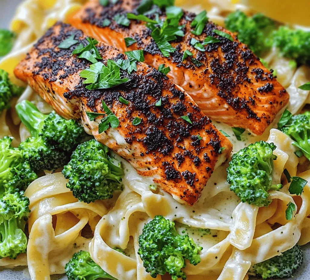 If you're looking for a dish that perfectly marries flavor, texture, and nutrition, look no further than Blackened Salmon with Creamy Broccoli Alfredo. This delectable recipe not only tantalizes the taste buds but also offers a feast for the eyes with its vibrant colors and appealing presentation. The dish features a spicy, smokey salmon fillet that's seared to perfection, complemented by a luscious creamy Alfredo sauce enveloping tender fettuccine, and topped with fresh, bright green broccoli.