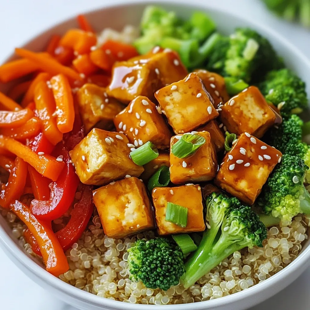 - 1 block (14 oz) firm tofu, pressed and cubed - 1 cup cooked quinoa - 1 cup broccoli florets - 1 red bell pepper, sliced - 1 carrot, julienned - 3 green onions, chopped The main ingredients offer a good balance of protein, carbs, and vitamins. Firm tofu gives the dish a hearty base. Cooked quinoa adds fluffy texture and complements the tofu well. Fresh vegetables like broccoli, bell pepper, and carrot add crunch, color, and nutrients. - 1/4 cup soy sauce (or tamari for gluten-free) - 2 tablespoons maple syrup - 1 tablespoon rice vinegar This sauce brings the dish to life. Soy sauce or tamari gives a salty depth. Maple syrup adds sweetness that balances the saltiness. Rice vinegar gives the sauce a tangy kick, enhancing the flavor. - 1 tablespoon cornstarch (optional for thickening) - Sesame seeds for garnish Cornstarch helps thicken the sauce for a glossy finish. Sesame seeds make a lovely garnish and add a nutty taste. You can use these optional ingredients to customize the dish to your liking. {{ingredient_image_1}} Start by pressing the tofu. This removes extra moisture. Wrap the block of tofu in a clean towel and place something heavy on top. Let it press for about 15 minutes. Next, cut the pressed tofu into small cubes. Aim for even pieces for even cooking. Heat one tablespoon of sesame oil in a large skillet over medium heat. Add the cubed tofu. Cook it for about 10 minutes. Turn the tofu pieces occasionally. You want them golden brown on all sides. In a bowl, combine the soy sauce, maple syrup, rice vinegar, garlic powder, and ginger powder. Mix well until everything blends. If you want a thicker sauce, add cornstarch. Mix one tablespoon of cornstarch with one tablespoon of water. Stir this into the sauce. This will help it thicken when cooked. Add the broccoli, red bell pepper, and carrot to the skillet with the tofu. Stir-fry these vegetables for about 5 to 7 minutes. You want them tender yet still crisp. Now, pour the teriyaki sauce over the tofu and vegetables in the skillet. Stir to coat everything well. Cook for another 2 to 3 minutes. This helps heat and thicken the sauce. To serve, divide the cooked quinoa among bowls. Top each with the teriyaki tofu and vegetables. Finish with chopped green onions and a sprinkle of sesame seeds. Enjoy your flavorful vegan delight! - Choosing the right tofu: Use firm tofu for the best texture. It holds its shape well and absorbs flavors. Avoid silken tofu as it is too soft for this dish. - Techniques for better browning: Press the tofu to remove moisture. This helps it brown nicely. Cut it into small cubes for even cooking. Heat the skillet well before adding tofu to get that golden crust. - Adjusting sauce sweetness: You can change the sweetness of the teriyaki sauce. Add more maple syrup for a sweeter taste. If you prefer less sweetness, reduce the syrup amount. - Marinating tofu before cooking: Marinate the cubed tofu in the teriyaki sauce. Let it sit for at least 15 minutes. This boosts the flavor and makes it more delicious. - Serving suggestions for an appealing dish: Serve the tofu over a bed of quinoa. This creates a nice base. Arrange the vegetables in a colorful way on top. - Ideal garnishes to enhance presentation: Sprinkle sesame seeds and chopped green onions on top. This adds crunch and freshness. A lime wedge on the side can brighten the dish. Pro Tips Press Tofu Properly: Ensure you press the tofu for at least 30 minutes to remove excess moisture, which helps it absorb flavors and achieve a crispier texture when cooked. Customize Vegetables: Feel free to swap in your favorite vegetables like snap peas, zucchini, or baby corn for added variety and nutrition. Adjust Sweetness: Depending on your taste preference, you can adjust the amount of maple syrup in the teriyaki sauce to make it sweeter or less sweet. Let it Marinate: For an even deeper flavor, marinate the cubed tofu in the teriyaki sauce for 15-30 minutes before cooking to infuse it with more deliciousness. {{image_2}} You can switch up the veggies in your teriyaki bowl. Fresh, seasonal vegetables add great flavor and color. Consider these options: - Snap peas for crunch - Zucchini for a mild taste - Cauliflower for extra texture - Red cabbage for vibrant color Mix and match these vegetables. This keeps your dish fresh and exciting. If you want a different protein, try tempeh or seitan. Both have great texture. They absorb flavors well, just like tofu. For a plant-based boost, add legumes. Chickpeas or black beans pack a protein punch. They also make the dish heartier and more filling. You can change the teriyaki sauce too. Use honey or agave syrup instead of maple syrup. Each sweetener gives a unique taste. For a spicy kick, add sriracha or red pepper flakes. Experiment with flavors to find what you love most! To keep your Teriyaki glazed tofu bowls fresh, follow these easy steps: - Refrigeration: Place the leftovers in an airtight container. Store in the fridge for up to 3 days. This helps keep flavors intact. - Reheating: To reheat, use a microwave or stovetop. On the stovetop, warm on low heat. Stir occasionally until heated through, about 5 minutes. If you want to save some for later, freezing works well: - Assembled Bowls: You can freeze the entire bowl. Just make sure to leave out the garnishes. Transfer to a freezer-safe container. - Components: Alternatively, freeze the tofu and vegetables separately. This gives you more flexibility. - Thawing: When you're ready to eat, thaw in the fridge overnight. For a quick option, use the microwave on low. Knowing how long your dish lasts is key: - Freshness: When stored properly in the fridge, the tofu bowls keep well for 3 days. For frozen bowls, enjoy them within 2-3 months for the best taste and texture. - Quality Check: Always check for off-smells or changes in color before eating. If something seems off, it's best to toss it. Yes, you can use extra-firm tofu. It has less moisture, which makes it denser. This can give you a firmer bite. However, it may not soak up the teriyaki sauce as well. If you choose extra-firm, cut it into smaller cubes. This helps it absorb more flavor while cooking. To make your Teriyaki Glazed Tofu Bowls gluten-free, swap soy sauce for tamari. Tamari is a gluten-free soy sauce. Check your maple syrup to ensure it has no added gluten. Also, make sure the cornstarch is gluten-free. These simple swaps let everyone enjoy this dish without worry. These bowls pair well with a variety of sides. Try serving them with a simple salad. A cucumber and carrot salad adds great crunch. You can also serve them with steamed edamame. For a drink, consider green tea or a light fruity beverage. These choices enhance the meal and keep it fresh. You now have a clear guide for making delicious Teriyaki Glazed Tofu Bowls. We covered the main ingredients, from firm tofu to fresh vegetables. The step-by-step instructions make cooking easy and fun. Tips for perfect tofu and presentation ensure great results. You can even mix things up with different vegetables or protein. Store leftovers properly to enjoy later. This dish is tasty, healthy, and adaptable, making it a great choice for anyone looking to explore plant-based meals. Enjoy your cooking!