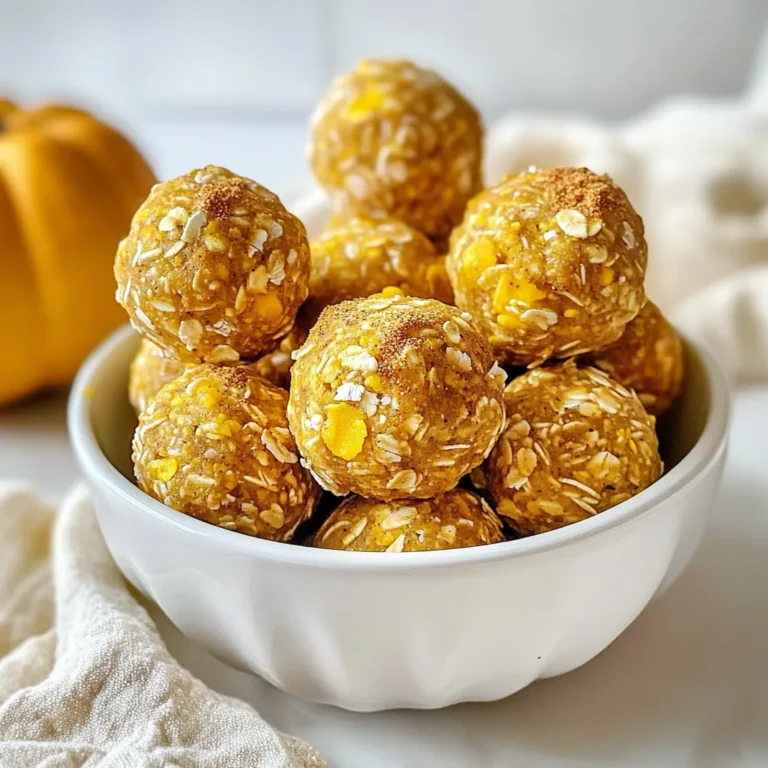 To make these pumpkin spice energy balls, you will need: - 1 cup rolled oats - 1/2 cup almond butter (or any nut butter) - 1/2 cup canned pumpkin puree - 1/4 cup honey or maple syrup - 1 teaspoon pumpkin spice mix (or a mix of cinnamon, nutmeg, and ginger) - 1/4 teaspoon salt - 1/2 cup ground flaxseed - 1/2 cup chocolate chips or chopped nuts (optional) These ingredients come together to create a tasty treat full of flavor. You can add more fun with these optional ingredients: - 1/2 cup chocolate chips - 1/2 cup chopped nuts - Extra pumpkin spice for rolling Feel free to mix and match to suit your taste! Each energy ball has great nutrition. Here’s a rough breakdown for one ball if you make 15: - Calories: 100 - Protein: 3g - Carbohydrates: 12g - Fat: 5g - Fiber: 2g These energy balls provide a good balance of protein, carbs, and healthy fats. Perfect for a quick snack! {{ingredient_image_1}} Start by gathering all your ingredients. You will need rolled oats, almond butter, canned pumpkin, honey or maple syrup, pumpkin spice mix, salt, ground flaxseed, and optional chocolate chips or nuts. Take a large mixing bowl. In this bowl, add: - 1 cup rolled oats - 1/2 cup ground flaxseed - 1 teaspoon pumpkin spice mix - 1/4 teaspoon salt Mix these dry ingredients well. This step ensures the flavors blend nicely. Now, take a separate bowl for the wet mix. Add in: - 1/2 cup almond butter - 1/2 cup canned pumpkin puree - 1/4 cup honey or maple syrup Stir them until your mixture is smooth. This ensures the pumpkin and nut butter mix well. Once it's ready, pour this wet mixture into your dry bowl. Stir until everything is well combined. If you want to add some fun, fold in: - 1/2 cup chocolate chips or chopped nuts This adds a nice texture and sweetness. After mixing, it’s time for a little rest. Place the bowl in the fridge for about 30 minutes. This helps the mix firm up. Once chilled, scoop out tablespoon-sized portions. Roll each portion into a ball using your hands. Place the balls on a parchment-lined baking sheet. If you like, roll them in extra pumpkin spice or shredded coconut for a tasty twist. Refrigerate them again for about 15 minutes. This final chill helps them hold their shape. Now, you have your delicious pumpkin spice energy balls ready to enjoy! Store your pumpkin spice energy balls in an airtight container. They stay fresh for about five days in the fridge. If you want to keep them longer, place them in the freezer. They can last for three months frozen. Just thaw them in the fridge before you eat. To get the best texture, use creamy almond butter. This helps bind the ingredients well. If the mix feels too dry, add a bit more pumpkin puree or nut butter. You want a sticky, moldable mix. Refrigerate it for 30 minutes to help it firm up before rolling into balls. Serve these energy balls as a snack or breakfast. Pair them with yogurt or fruit for a fun twist. You can also roll them in shredded coconut or cocoa powder for extra flavor. For a festive touch, sprinkle more pumpkin spice on top before serving. Pro Tips Use Fresh Pumpkin Spice: For the best flavor, consider making your own pumpkin spice mix using fresh ground spices instead of store-bought versions. Customize Your Nut Butter: Experiment with different nut butters like peanut or cashew for varied flavors and textures in your energy balls. Chill for Better Texture: Allow the mixture to chill for longer than 30 minutes if you find it too sticky to handle when rolling into balls. Store Properly: Keep your energy balls in an airtight container in the fridge for up to a week or freeze them for longer shelf life. {{image_2}} You can change the taste of your pumpkin spice energy balls easily. Want a chocolate twist? Just add 1/2 cup of chocolate chips. Prefer a nut-free version? Swap the almond butter for sunflower seed butter. You still get great flavor and texture. Not all of us have the same pantry items. If you lack oats, try using quinoa flakes. No pumpkin puree? Applesauce works well too. If you want a vegan option, replace honey with maple syrup. Each swap can create a fun new taste while keeping the energy boost. These energy balls are great year-round but can shine during holidays. In fall, add chopped pecans or walnuts for extra crunch. In winter, mix in dried cranberries for a festive touch. For a spring vibe, try adding in a hint of lemon zest. Each season brings a chance for a new flavor adventure. Store your pumpkin spice energy balls in an airtight container. This keeps them fresh. You can use a glass jar or a plastic container with a tight lid. Make sure to layer parchment paper between the balls. This helps prevent them from sticking together. Keep them in the fridge for the best taste and texture. You can freeze your energy balls if you want to save some for later. First, place the balls on a baking sheet. Make sure they are not touching each other. Freeze them for about 1-2 hours. Once they are firm, transfer them to a freezer-safe bag. Label the bag with the date. They will stay fresh for up to three months. When stored in the fridge, your energy balls can last up to one week. If you freeze them, they last longer, as mentioned. Always check for any signs of spoilage before eating. If they look or smell off, it’s better to throw them away. Enjoy your tasty snacks while they are fresh! Yes, you can use any nut butter you like. Almond butter is great, but peanut butter works too. Sunflower seed butter is a good option if you want a nut-free recipe. Each nut butter adds a unique taste and texture. Choose what you enjoy most. These energy balls can last about one week in the fridge. Keep them in an airtight container to stay fresh. If you want them to last longer, you can freeze them. They can stay good for up to three months in the freezer. Absolutely! To make pumpkin spice energy balls vegan, swap honey for maple syrup. All other ingredients are already vegan. This way, you can enjoy the tasty energy balls without any animal products. We covered how to make pumpkin spice energy balls. You learned about the ingredients, from the basics to optional ones. We walked through each step of making them, including mixing and shaping. I shared tips on storage and texture. You also explored flavor variations and seasonal twists. These simple snacks are tasty and fun to make. Enjoy creating your own variations, and don’t forget to share them with friends!