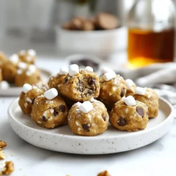 To make no-bake cookie dough bites, you need these simple ingredients: - 1 cup almond flour - 1/2 cup peanut butter (or almond butter) - 1/4 cup maple syrup - 1 teaspoon vanilla extract - 1/4 teaspoon salt - 1/2 cup dark chocolate chips - 1/4 cup crushed walnuts (optional) - 1/4 cup mini marshmallows (optional) These items blend well and create a tasty treat. If you run out of something, here are easy swaps: - Almond flour: Use oat flour or all-purpose flour. - Peanut butter: Almond butter or sunflower seed butter works too. - Maple syrup: Honey or agave syrup can replace it. - Dark chocolate chips: Use milk chocolate or white chocolate chips. - Crushed walnuts: Skip them or use pecans. - Mini marshmallows: Use regular-size marshmallows, cut into bits. These changes can keep the fun going without stress. Here’s a quick look at the nutrition per bite: - Calories: About 100 - Protein: 3 grams - Fat: 6 grams - Carbs: 8 grams - Fiber: 1 gram These bites are a good mix of protein and healthy fats. Enjoy them as a snack or dessert! {{ingredient_image_1}} To make the dough, grab a large mixing bowl. Add 1 cup of almond flour, 1/2 cup of peanut butter, and 1/4 cup of maple syrup. Mix in 1 teaspoon of vanilla extract and 1/4 teaspoon of salt. Use a spatula to combine all the ingredients. You want a smooth dough. If it feels too dry, add a bit more maple syrup or nut butter. Keep mixing until it’s easy to mold. Now it’s time to form the bites. Take a tablespoon of dough and roll it into a ball. Each ball should be about the size of a golf ball. Place them on a plate or a baking sheet lined with parchment paper. Make sure to leave some space between each bite. It’s fun to get your hands a little messy here! After rolling all the dough into balls, it’s time to chill them. Place the plate or baking sheet in the fridge. Let them sit for at least 30 minutes. This helps the bites firm up and makes them easier to eat. Once chilled, you can enjoy them right away or save them for later. To get the right texture for your no-bake cookie dough bites, start with the right almond flour. Use finely ground almond flour for a smooth dough. Mix the ingredients well but don’t overdo it. If the dough feels too dry, add a bit more maple syrup or nut butter. This helps the dough hold together. It should feel moldable but not sticky. One mistake is using chunky nut butter. This can make the texture uneven. Avoid skipping the salt. It enhances the flavor of the cookie dough. Don’t forget to refrigerate the bites. This step firms them up. If you skip it, they may fall apart when you eat them. Lastly, don’t rush the mixing. A good mix ensures all flavors blend well. Make your cookie dough bites look fun and tasty! Roll them in crushed walnuts or cocoa powder for a nice touch. You can also drizzle melted chocolate on top for extra sweetness. For a pop of color, sprinkle mini marshmallows on top. This adds a fun look and extra flavor. Serve them on a colorful plate to impress your friends and family. Pro Tips Consistency is Key: Ensure the dough is moldable by adjusting the amount of maple syrup or nut butter. This will help in rolling perfect bites. Chill for Best Results: Refrigerating the bites for at least 30 minutes will firm them up and enhance their texture, making them easier to enjoy. Customize Your Mix-ins: Feel free to substitute or add other mix-ins like dried fruits or seeds to personalize your cookie dough bites. Storage Matters: Keep the bites in an airtight container in the fridge for up to a week for optimal freshness and flavor. {{image_2}} You can easily make these bites vegan. Start with almond flour as your base. Use almond butter instead of peanut butter. Replace maple syrup with agave syrup if you like. This swap keeps it sweet and tasty. These cookie dough bites are naturally gluten-free. Almond flour is a great choice. It gives a nice texture without gluten. Just ensure your chocolate chips are gluten-free. Some brands may add gluten, so check the label. Feel free to get creative with flavors! Here are some fun ideas: - Cocoa Powder: Add 2 tablespoons for a chocolate twist. - Coconut Flakes: Stir in 1/4 cup for a tropical flair. - Peanut Butter Chips: Replace dark chocolate chips with these for extra peanut flavor. - Dried Fruits: Try adding mini cranberries or raisins for a chewy texture. Mix and match these ideas to find your favorite flavor. Each bite can be a new delight! To keep your no-bake cookie dough bites fresh, use an airtight container. Place a layer of parchment paper between the bites to prevent sticking. You can stack them, but be careful. This method keeps them safe and tasty. No-bake cookie dough bites last up to one week in the fridge. If you want to store them longer, freeze them. They can stay in the freezer for about three months. Just place them in a freezer-safe bag or container. When you're ready to enjoy, let them thaw in the fridge. You don't need to reheat these bites. They taste best cold or at room temperature. Enjoy them straight from the fridge for a cool treat! Yes, you can use other nut butters. Almond butter works well. Cashew butter is another good choice. Just make sure the nut butter is smooth. This helps the dough mix well. You can also use sunflower seed butter for a nut-free option. Each nut butter adds its own flavor. So, feel free to experiment! No-bake cookie dough bites last about one week in the fridge. Store them in an airtight container. This keeps them fresh and tasty. If you want them to last longer, you can freeze them. They will stay good for about three months in the freezer. Just remember to thaw them in the fridge before eating. You can definitely make these without chocolate chips. If you prefer a different flavor, try adding dried fruit. Raisins or cranberries add a nice touch. You can also use seeds like chia or flax for extra crunch. Just adjust the sweetness a bit if needed. These bites will still be delicious! This blog post covered everything you need for making no-bake cookie dough bites. We explored ingredients, step-by-step instructions, and valuable tips. You learned about variations like vegan and gluten-free options, plus how to store them correctly. Enjoy experimenting with different flavors. Don't fear mistakes; they help you learn. With practice, your cookie dough bites will impress friends and family. Happy baking!
