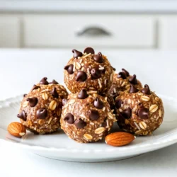 To make Almond Joy Energy Bites, you need a few tasty ingredients. Here’s the detailed list: - 1 cup rolled oats - 1/2 cup almond butter - 1/3 cup honey or maple syrup - 1/2 cup unsweetened shredded coconut - 1/2 cup dark chocolate chips - 1/4 cup chopped almonds - 1 teaspoon vanilla extract - A pinch of sea salt These ingredients work together to create a delightful snack. The rolled oats give a nice base. Almond butter adds creaminess and healthy fats. Honey or maple syrup gives sweetness. Shredded coconut brings a tropical twist. Dark chocolate chips add rich flavor. Chopped almonds provide a nice crunch. Vanilla extract gives warmth, and sea salt enhances all the flavors. Feel free to mix and match based on what you have at home. Each ingredient plays a role in making these bites both yummy and satisfying. {{ingredient_image_1}} - Mixing the base ingredients Start with a large bowl. Add 1 cup of rolled oats, 1/2 cup of almond butter, and 1/3 cup of honey or maple syrup. Stir these together until they blend well. This mix forms the base of your energy bites. - Incorporating additional flavors Next, add 1/2 cup of unsweetened shredded coconut, 1/2 cup of dark chocolate chips, and 1/4 cup of chopped almonds. Don’t forget to include 1 teaspoon of vanilla extract and a pinch of sea salt. Mix everything until all flavors combine nicely. - Shaping the energy bites Now, take small portions of the mixture. Use your hands to roll them into balls. Each ball should be about 1 tablespoon in size. Aim for around 15-20 bites. They should fit easily in your palm. - Refrigeration process Line a baking sheet with parchment paper. Place your energy bites on the sheet. Then, put them in the fridge for at least 30 minutes. This helps the bites firm up and hold their shape. After that, they are ready to enjoy, or you can store them for later! - Ensuring the right texture: To get the best texture, make sure to mix all the ingredients well. If the mixture feels too dry, add a bit more almond butter or honey. If it's too wet, add some oats or shredded coconut. - Customizing sweetness preferences: You can adjust the sweetness by changing the amount of honey or maple syrup. Start with a little less, taste, and add more if you like it sweeter. - Alternative binding agents: If you don't have almond butter, try peanut butter or sunflower seed butter. These options still hold the bites together and add their own flavors. Pro Tips Chill for Better Texture: Refrigerating the bites for at least 30 minutes helps them firm up, making them easier to eat and enhancing the flavor. Customize Your Nuts: Feel free to swap out the chopped almonds for other nuts like walnuts or pecans for a different flavor profile. Use Natural Sweeteners: If you prefer a lower glycemic index option, opt for coconut nectar or agave syrup instead of honey or maple syrup. Store for Freshness: Keep the energy bites in an airtight container in the fridge to maintain their freshness for up to a week. {{image_2}} You can have fun with Almond Joy Energy Bites by trying new flavors. Here are some ideas: - Nut-free alternative options: If you want to skip nuts, use sunflower seed butter. It gives a similar creamy texture. You can also swap chopped almonds for pumpkin seeds. Both add crunch and taste. - Adding protein powder for nutrition: Want a protein boost? Mix in some chocolate or vanilla protein powder. About two tablespoons works well. This change makes your bites even better for a post-workout snack. - Experimenting with dried fruits or seeds: Dried fruits can add sweetness. Try raisins, cranberries, or chopped dates. Seeds like flax or chia can boost health benefits. Both options add flavor and texture to your bites. These variations let you customize your energy bites. Enjoy making them your own! To keep your Almond Joy Energy Bites fresh, use an airtight container. Glass containers or heavy-duty plastic work best. They help keep air out and moisture in. Shelf life in the fridge vs. freezer In the fridge, these bites last up to one week. If you need them to last longer, freeze them. In the freezer, they stay good for about three months. Just thaw them in the fridge before eating. Tips for freshness Make sure to separate layers with parchment paper if you stack them. This keeps them from sticking together. Also, check for any signs of spoilage like odd smells or changes in texture. Enjoy your bites fresh for the best taste! Can I substitute almond butter with another nut butter? Yes, you can use other nut butters. Peanut butter or cashew butter works great. Just make sure it has a similar texture. The flavor will change a bit, but it will still taste good. How do I make these bites vegan-friendly? To make these bites vegan, swap honey with maple syrup. Use dark chocolate that is dairy-free. This way, you keep the flavors but make it plant-based. What are the nutritional benefits of energy bites? Energy bites are packed with good nutrients. Here are some benefits: - Rolled oats provide fiber for digestion. - Almond butter offers healthy fats and protein. - Dark chocolate gives antioxidants and a touch of sweetness. - Coconut adds healthy fats and a fun texture. These bites make a great snack, keeping you full and energized! This blog post covered how to make Almond Joy Energy Bites. We reviewed the ingredients needed, like oats and almond butter, and the step-by-step method for preparing them. I shared tips to perfect your bites, possible variations, and how to store them correctly. Remember, these energy bites are not just tasty but also easy to customize. Try different flavors or adjustments to make them your own. Enjoy your energy bites on the go, guilt-free!